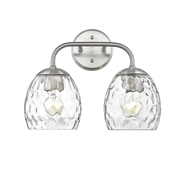 A versatile bath vanity fixture in timeless brushed nickel finish that complements both traditional and contemporary bathroom designs. Ideal for providing functional task lighting at the mirror.