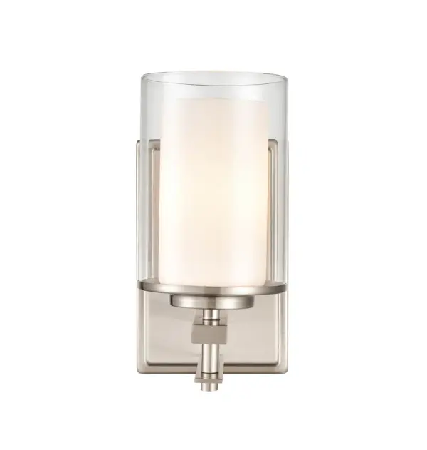The 5501 wall sconce in brushed nickel offers a clean, timeless aesthetic that complements both contemporary and traditional interiors. Its neutral metallic finish provides versatile styling options.