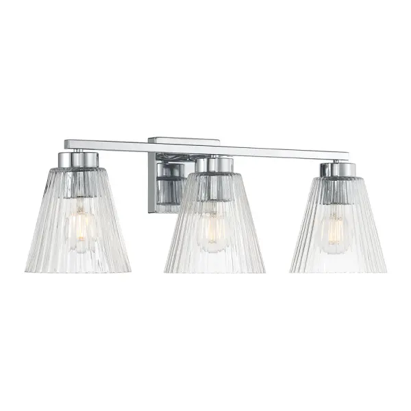 The Rivelle vanity light combines crisp angular lines with clear striated glass for a distinctive modern aesthetic. Its minimalist chrome finish and dappled glass effect create sophisticated illumination perfect for contemporary bathrooms.