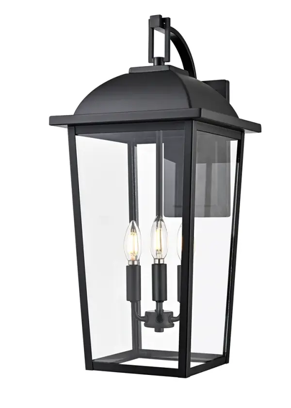 The Houston outdoor sconce combines timeless shepherd-hook styling with contemporary refinement. Crystal clear glass panels and an elongated profile create instant curb appeal, while the minimalist back plate keeps focus on the warm glow.