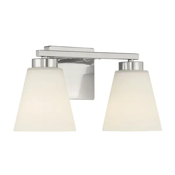 The Strayhan 2-light vanity bar combines streamlined design with flared crystal-clear glass shades in brushed nickel finish. Perfect for modern bathrooms seeking understated sophistication and versatile styling.