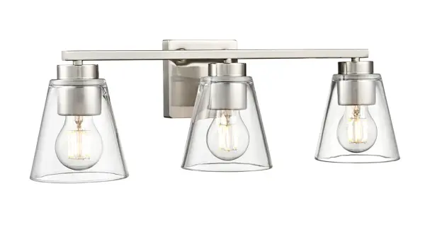 The Strayhan 2-Light Vanity combines streamlined design with flared crystal-clear glass shades, creating a sophisticated fixture perfect for modern bathrooms. The brushed nickel finish adds versatility.