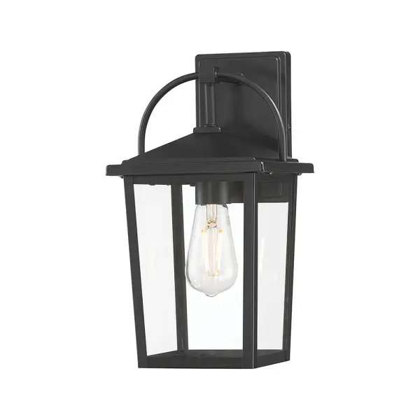 The Strathden Collection brings playful elegance to outdoor spaces with its antique handheld lantern inspiration. The graceful oversized handle arcs over clear glass panels, creating welcoming illumination from driveway to entryway.