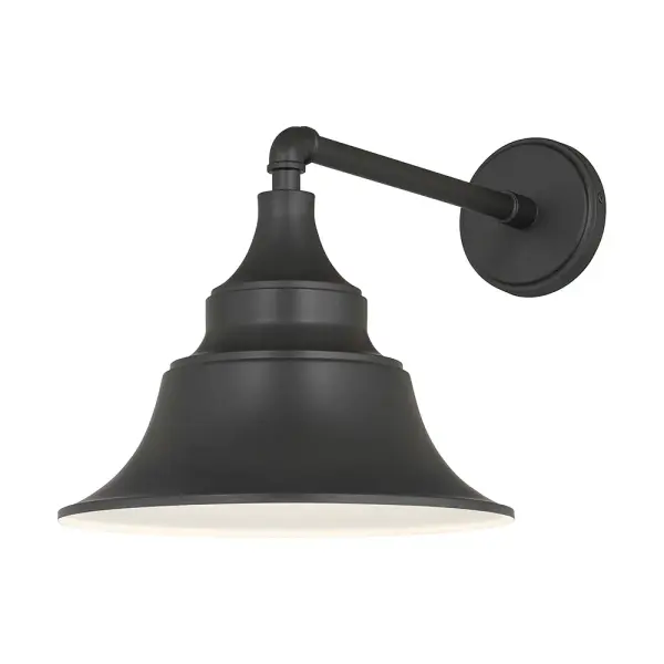 The Varnel outdoor wall sconce brings authentic industrial charm to exterior spaces with its vintage-inspired design and durable powder-coated steel construction, perfect for post-modern and early 20th century homes.