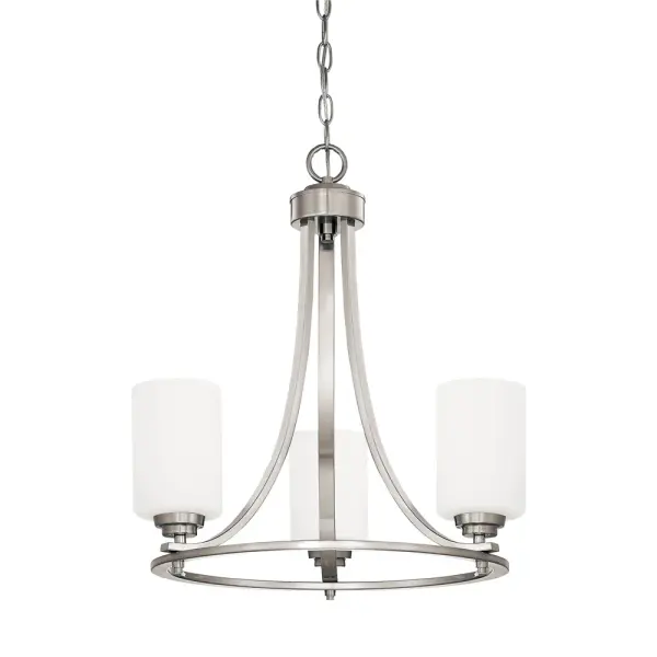 The 7253 chandelier in brushed nickel offers a refined metallic finish that complements both contemporary and traditional interiors. Its neutral tone makes it adaptable to various room settings.