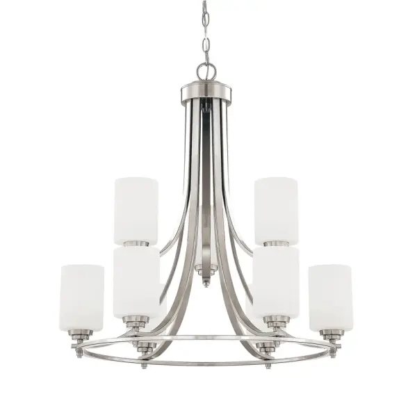 A transitional chandelier featuring a brushed nickel finish that complements both contemporary and traditional interiors. Its neutral metallic tone provides versatile styling options for various room settings.