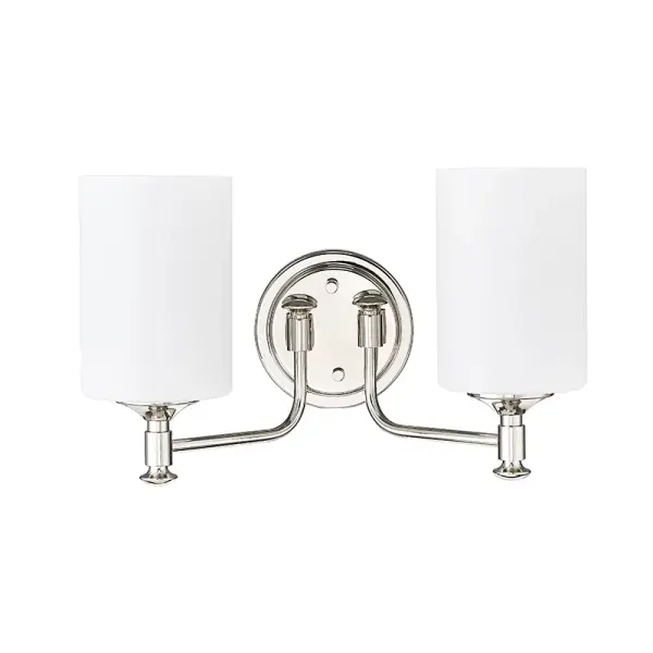 The 91032 vanity light in polished nickel offers a versatile transitional design that complements both traditional and contemporary bathrooms with its refined metallic finish and clean aesthetic.