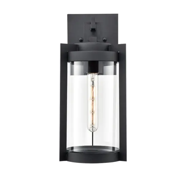 This outdoor wall light combines contemporary styling with weather-resistant construction. The textured black finish provides durability and visual interest while complementing various architectural styles.