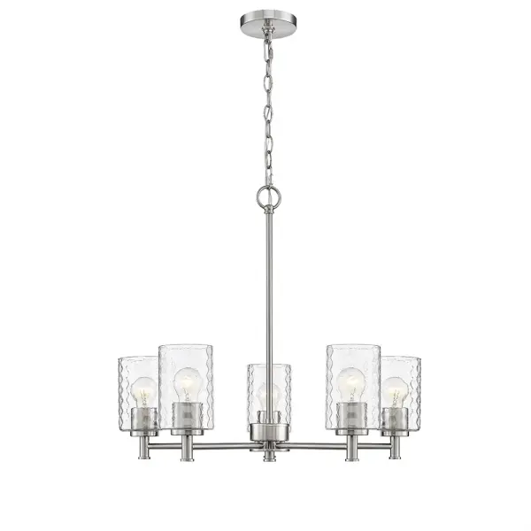 The 9215 chandelier in brushed nickel offers a refined transitional aesthetic that complements both traditional and contemporary interiors. Its neutral metallic finish provides versatility across various design schemes.