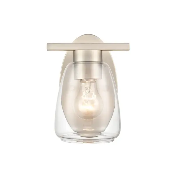 The 9361 wall sconce in brushed nickel offers a clean, timeless aesthetic that complements both contemporary and traditional interiors. Its neutral metallic finish provides versatile styling options.