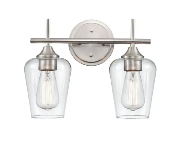The 9702 vanity light offers timeless transitional styling with a versatile brushed nickel finish. Perfect for bathroom vanities, this fixture provides functional task lighting with understated elegance.