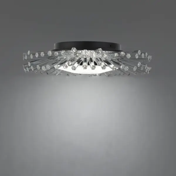Benediction is a subtle statement of calming elegance. A ring adorned with sprays of crystals reminiscent of stalactites in a cavern are illuminated generously from within with hidden LEDs. Unique and inspiring.
