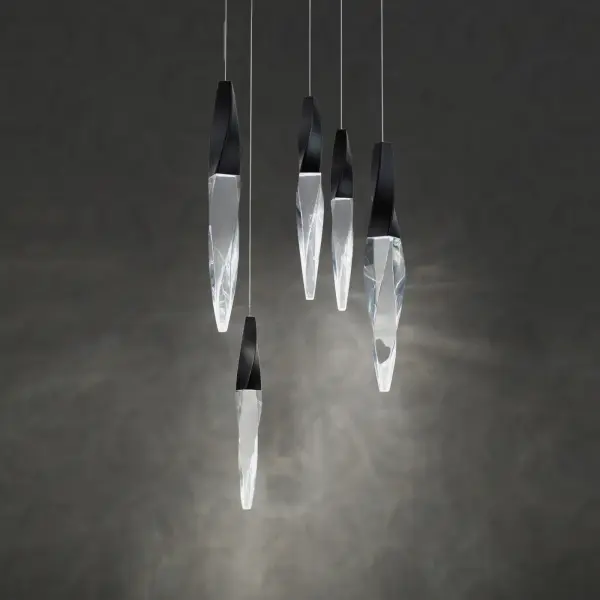 The Kindjal combines architectural elegance with modern LED technology. Five twisted optic crystal icicles create dramatic visual interest while concealing powerful integrated LEDs. The aged brass finish adds warmth and sophistication.