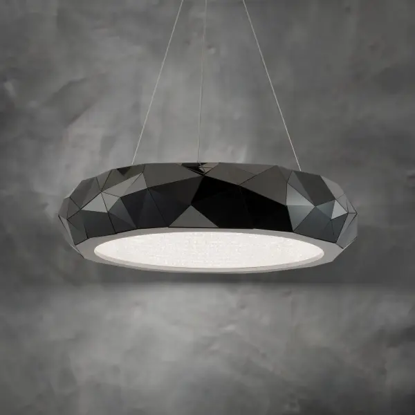 Create a glamorous and edgy motif with Mosaic, a jewelry-inspired pendant. Over 60,000 pieces of hand-applied Radiance® Crystal Dust covers the entire inner diffuser to provide the captivating sparkle of this modern crystal luminaire. A sculptural masterpiece to illuminate any table or surface in a home, hotel or office.