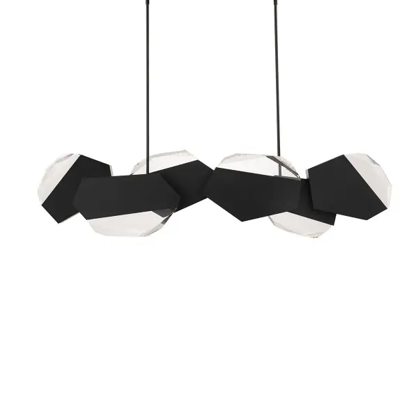 A treasure trove of Optic Crystal is interlaid with tiny facets of Radiance® Crystal Dust and illuminated from within. Light and shadow dance between the sparkling crystal and overlapping black metallic planes.
