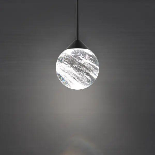 Crystal ball patterned to offer enhanced illumination. This Schonbek Optic Haze® Quartz sphere projects omnidirectional high quality LED illumination for an astonishing, graceful aesthetic.