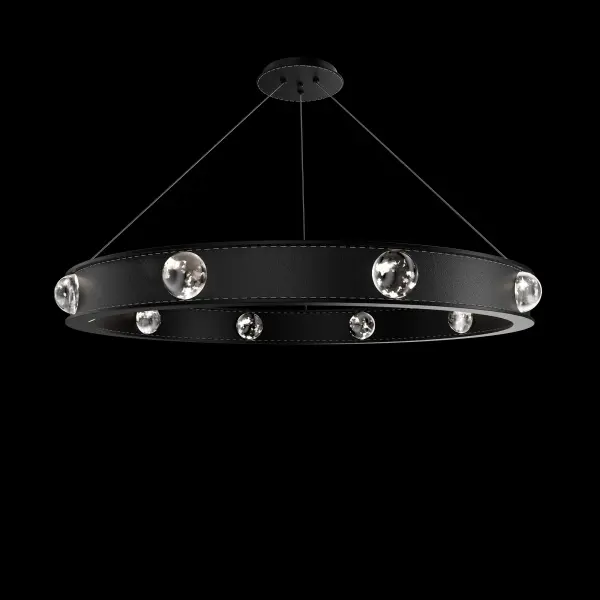 Like the refined elegance of high-end accessories, this round pendant light combines luxurious leather with the brilliance of crystal. The supple band is beautifully studded with round crystal elements that catch the light with every angle. Hidden LEDs gently illuminate the crystals, casting a soft, radiant glow that enhances the pendant’s textured beauty.