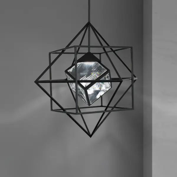 The Heracles pendant is a show-stopping modern fixture that commands attention with its nested cube design and faceted Optic Crystal centerpiece. At 28 inches, it's a bold architectural element perfect for grand spaces.