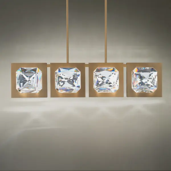 A lustrous combination of sleek metal and a channel-set faceted crystal, Enchante is brought to life by LEDs integrated within the luminaire, creating a timeless luxe of beautiful, ambient lighting.