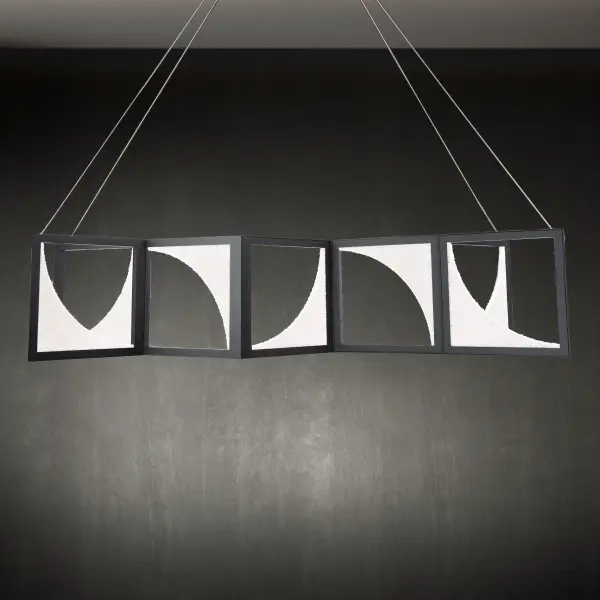 Thousands of hand-applied precision cut Radiance® Crystal Dust shaped into glowing crescent silhouettes are captured within a sleek frame, rendering a fascinating abstract aesthetic that mesmerizes from above.
