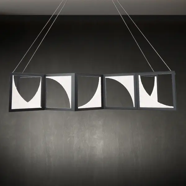 Thousands of hand-applied precision cut Radiance® Crystal Dust shaped into glowing crescent silhouettes are captured within a sleek frame, rendering a fascinating abstract aesthetic that mesmerizes from above.