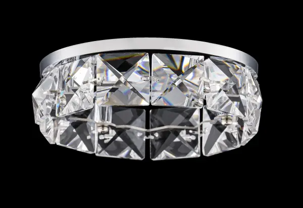 LED light plays with a circle of sparkling Schonbek Radiance® Crystal squares, animating ceilings with multidimensional reflections while delivering even illumination.