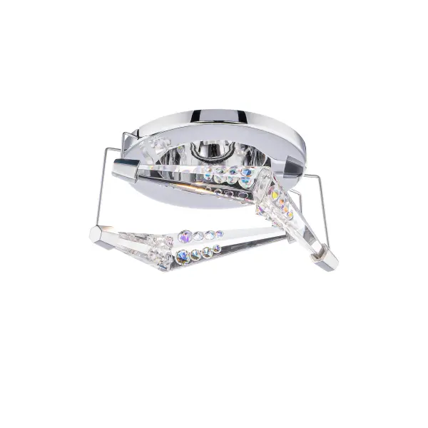 Stunning Schonbek Radiance® prisms descend from a central canopy, creating an inner dynamism of lines, angles and planes in perpetual motion, throwing luminous beams in different directions.