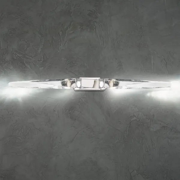 A subtle twist of luxe. Kindjal features exquisite Optic Crystal icicles that twist to a point from a cohesive metal casting, concealing a powerful LED that provide ample illumination. Stylish, textured materiality.