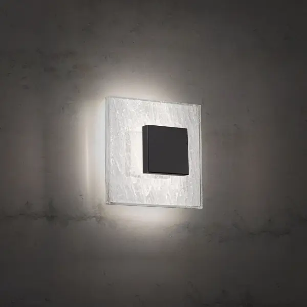 Enjoy indirect illumination from this modern wall or ceiling element. LEDs illuminate its stunning shatter patterned reclaimed crystal.