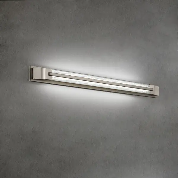 A sleek modern LED luminaire with clean lines, crisp styling, reclaimed crystal in a shatter pattern. Aberdeen offers ample ambient task illumination for both residential and commercial settings. Luxury is in the details.
