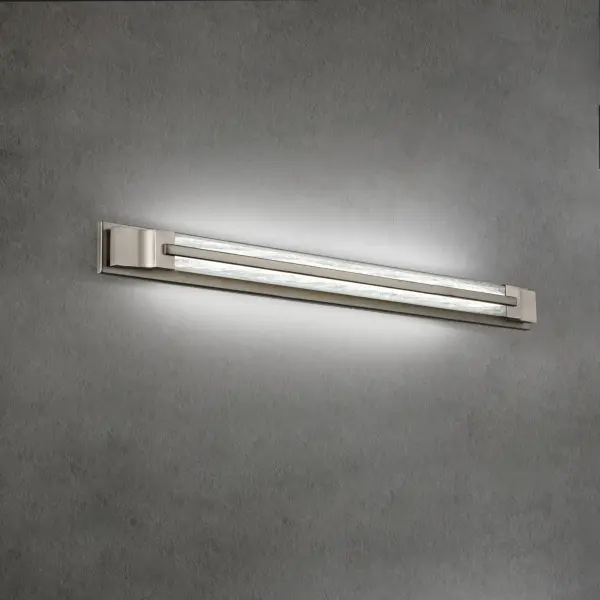 A sleek modern LED luminaire with clean lines, crisp styling, reclaimed crystal in a shatter pattern. Aberdeen offers ample ambient task illumination for both residential and commercial settings. Luxury is in the details.