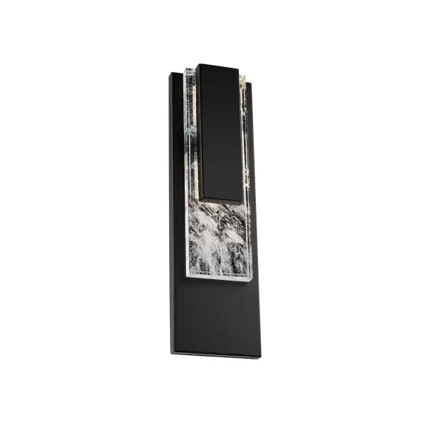 Precisely cut Optic Haze® Quartz is framed by planes of opaque matte metal. LED illumination reflects off a mirror-like stainless steel backplate, casting light through the crystal and highlighting its unique patterning.
