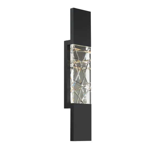 Uniting bold geometric angles, clear crystal in an interlocking pattern delivers textured backlit illumination. Its sleek black base casts downlight for wayfinding at night.