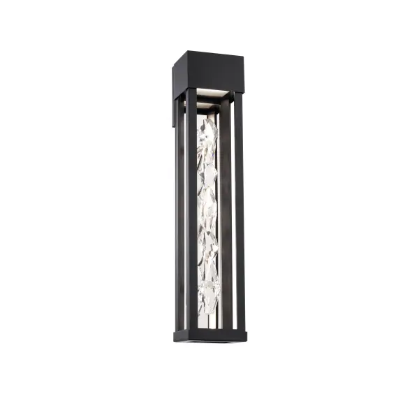 Clean lines frame a shimmering pour of crystal. Illuminated from above, the brilliant column captures rhythms and textures of transparency, luminosity and shadows creating a stunning focal point on a luxury home’s exterior.