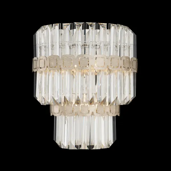 With a striking sense of symmetry and light play, Alina captures the allure of sculptural precision. Cascading tiers of Optic Crystal bars are encircled by laser-cut metal bands with a signature square motif. Its pyramid form radiates contemporary elegance, while each crystal refracts light in dazzling layers of brilliance.