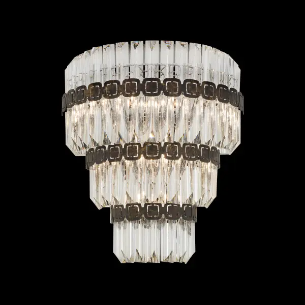 With a striking sense of symmetry and light play, Alina captures the allure of sculptural precision. Cascading tiers of Optic Crystal bars are encircled by laser-cut metal bands with a signature square motif. Its pyramid form radiates contemporary elegance, while each crystal refracts light in dazzling layers of brilliance.