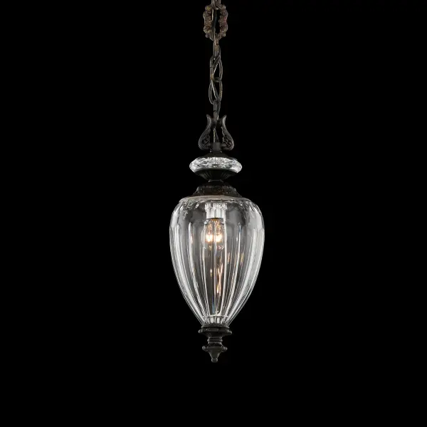 Victorian grandeur is reimagined for the modern age in the Dyana Collection. Each exquisite pendant showcases an oval-shaped Cut Heritage® Crystal glass shade, masterfully faceted to reflect a soft, prismatic glow. Hand-finished cast metalwork crowns and anchors the design, adorned with scrolls, flourishes, and an ornate decorative chain that echoes the Old World charm and craftsmanship of a bygone era.