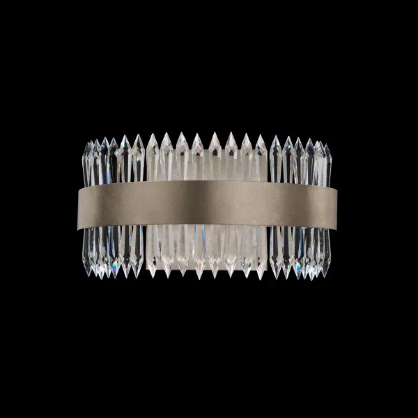 Evoking the beauty of glistening icicles on a winter morning, Annaberg captures light in its purest form. Sleek spears of multi-faceted Radiance® Crystal are hand-pinned in perfect alignment to a finely curved, hand-bent metal band, forming a sculptural half-ring of luminous artistry.