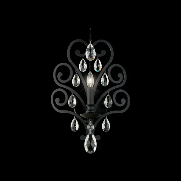 Majestic and mysterious, Conclave evokes the grandeur of a jeweled headdress. Each piece features sweeping arabesques of hand-finished metal, shaped with the grace of fine ornamentation and crowned with  Radiance® or vintage-hued colored crystal. Elegant scrollwork, fine detailing, and candle-inspired lamps create a captivating fusion of mystery, tradition, and timeless sophistication.