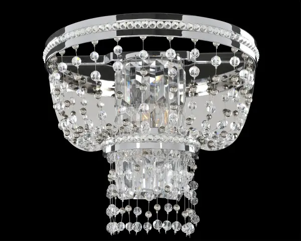 A modern version of the classic empire style frames feature an interior column of Firenze crystal along with jeweled embedded bandings and shimmering polished chrome beads and crystals flowing the top to the basket. Collection: Capri Rooms: Living Room, Bedroom, Family Room, Dining Room Finish: Chrome Glass: Firenze Clear Notes: Firenze Clear Width: 13.00" Height: 11.00" Weight: 7.00 lb Extension from Wall: 7.00" Wire: 12`` Canopy: 6``x1`` Number of Bulbs: 2 Maximum Wattage: 40.00 W Bulb Base: E12 Candelabra Dimmable Voltage: 120.00 V Material: Steel Country of Origin: China Safety Listing: Dry Safety Rating: cETL