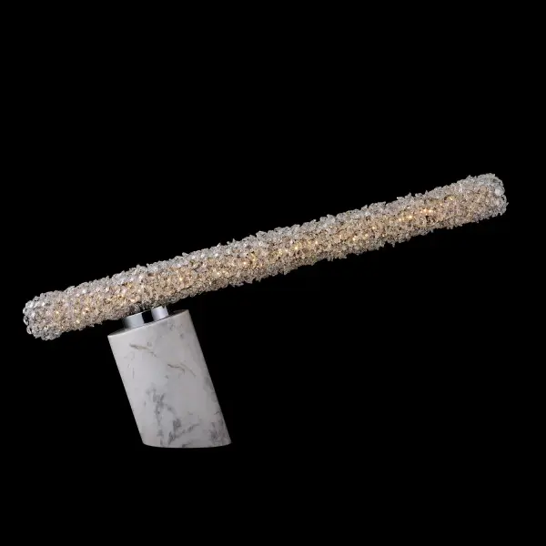 The Lina Buffet Lamp combines contemporary design with luxurious Firenze crystal strands wrapped around a polished chrome frame. At 29 inches tall, it makes a stunning statement on buffets and console tables while providing ambient lighting.