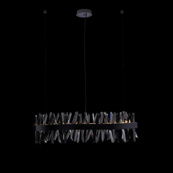 The Glacier collection delivers bold contemporary style with its striking combination of Black Nickel finish, smokey ice-like crystals, and seamless integrated LED lighting. This 42-inch linear pendant makes a dramatic statement.