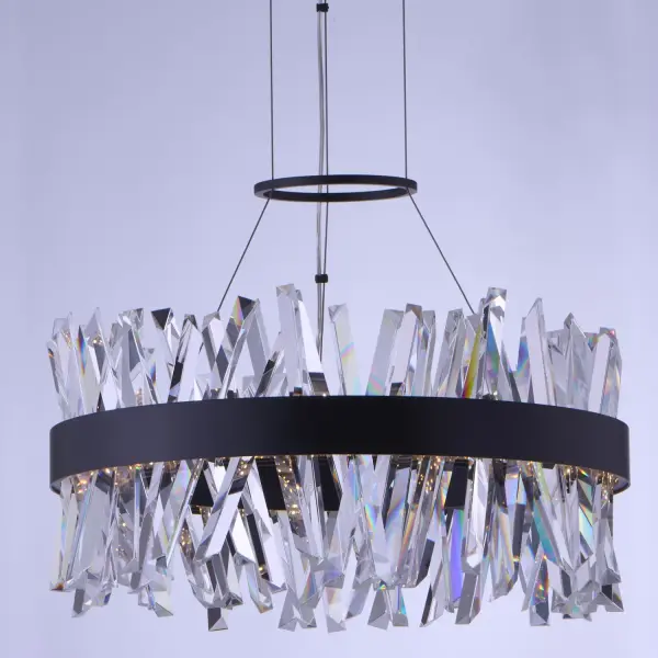 The Glacier LED Pendant combines innovative crystal craftsmanship with modern LED technology. Featuring chiseled clear crystal spears in a dramatic 25-inch round design, this statement piece delivers both sculptural beauty and energy-efficient illumination. - alternate view