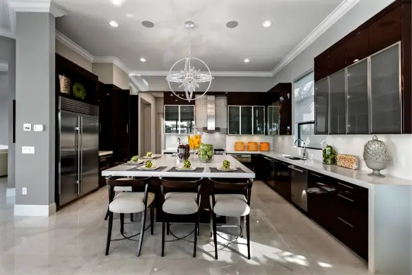 The Angelo 26" pendant combines dramatic scale with refined crystal craftsmanship. Its spiky Firenze crystal center creates a sputnik-inspired focal point within a polished silver orb frame, perfect for spaces that demand sculptural lighting. - alternate view