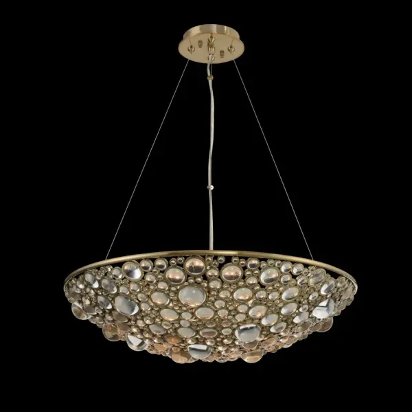 The Ciottolo pendant brings organic inspiration to modern design with its distinctive K9 crystal glass baubles set in a brushed champagne gold frame. At 24 inches wide, it delivers sophisticated sparkle perfect for dining spaces.