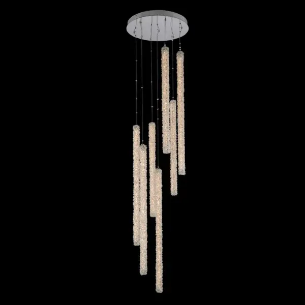 The Lina 7 Column LED Foyer brings contemporary elegance with cascading Firenze crystal strands wrapped around a polished chrome frame. Pre-dressed for easy installation, this dramatic 24-inch diameter fixture creates a stunning focal point in high-ceiling spaces.