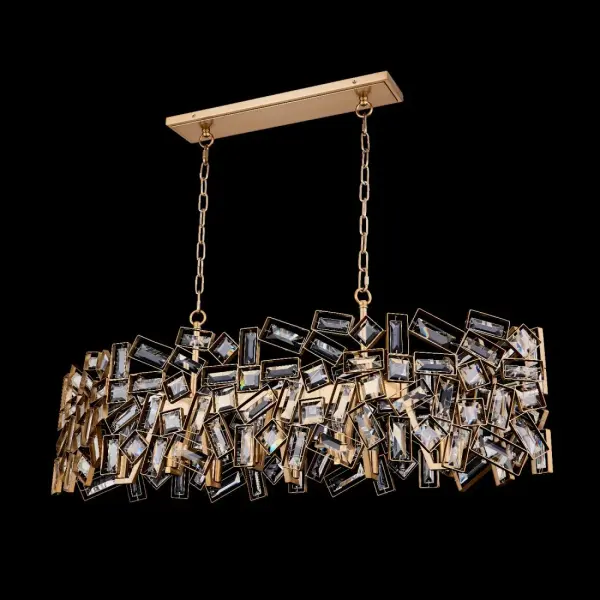 The Inclanata 54" Island Pendant combines modular geometric design with luxurious Firenze crystal baguettes in a warm Winter Brass finish. Its substantial 44-inch length and futuristic appeal make it perfect for large islands and dining tables.