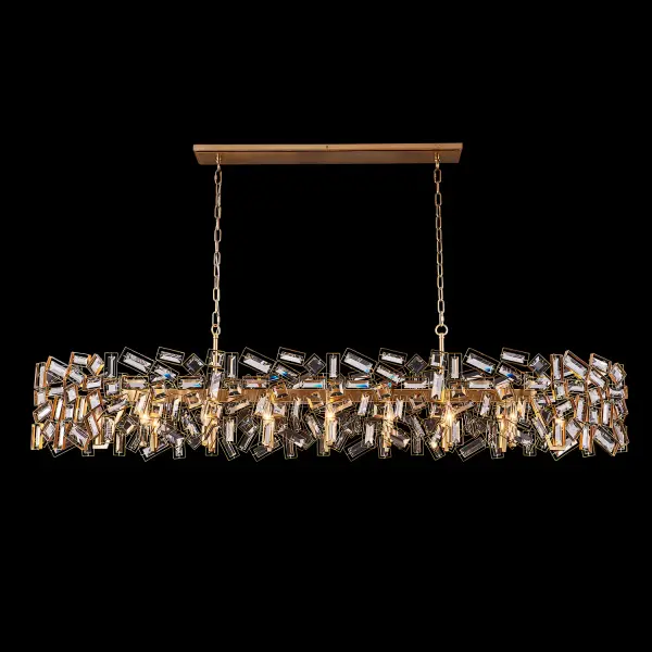 The Inclanata 72" Island Light combines geometric Art Deco design with luxurious Firenze crystal baguettes in a warm Winter Brass finish. Its modular, futuristic appeal makes it a show-stopping centerpiece for large kitchens and dining areas.