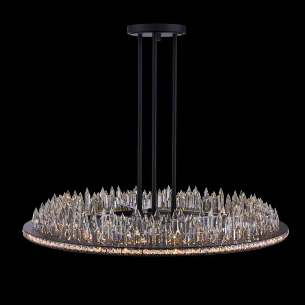 The Orizzonte pendant by Vanessa DeLeon transforms spaces with its architectural layered Firenze crystal design. At 36 inches wide, this statement piece features embedded squares creating a modern silhouette with integrated LED downlight.