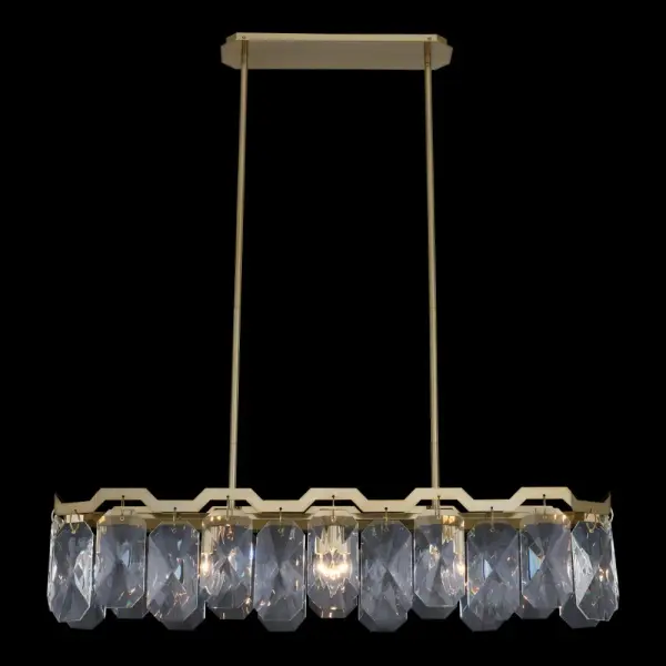 The Piatta 47" Island Pendant showcases custom emerald-cut crystals framed in brushed Champagne Gold, creating a sophisticated statement piece that balances minimalist design with luxurious materials.